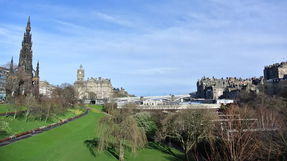 Princes Street Gardens in Edinburgh with the Scott Monument, the Balmoral clock tower and the Old Town