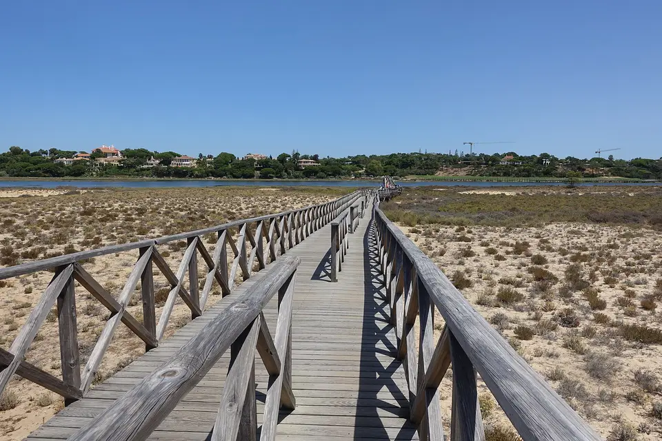 The wooden footbridge across the dunes and Ria Formosa to the beach at Quinta do Lago