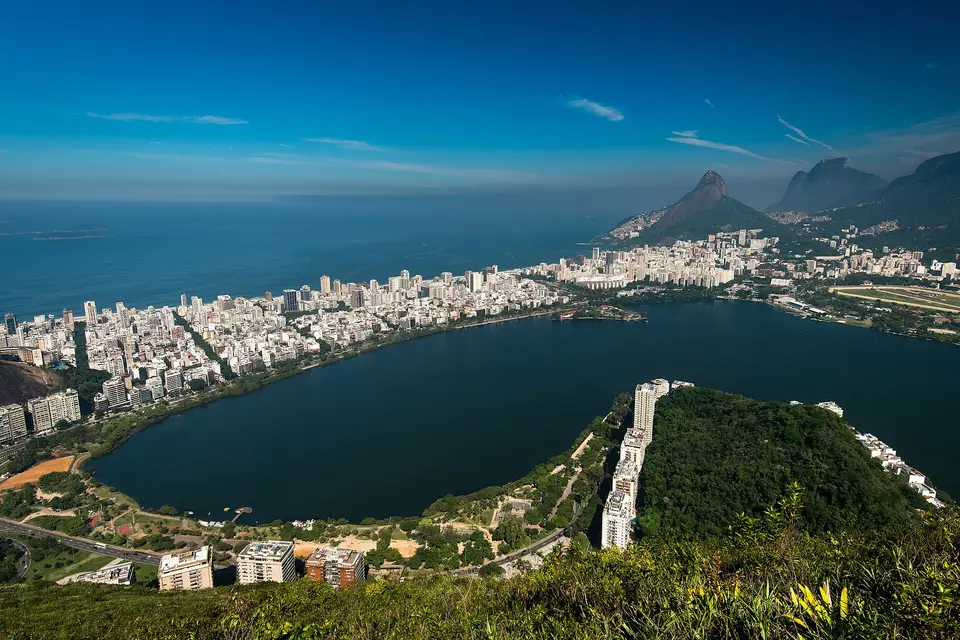 Lagoa Rodrigo de Freitas lagoon ringed by apartment blocks, with Ipanema and the ocean beyond