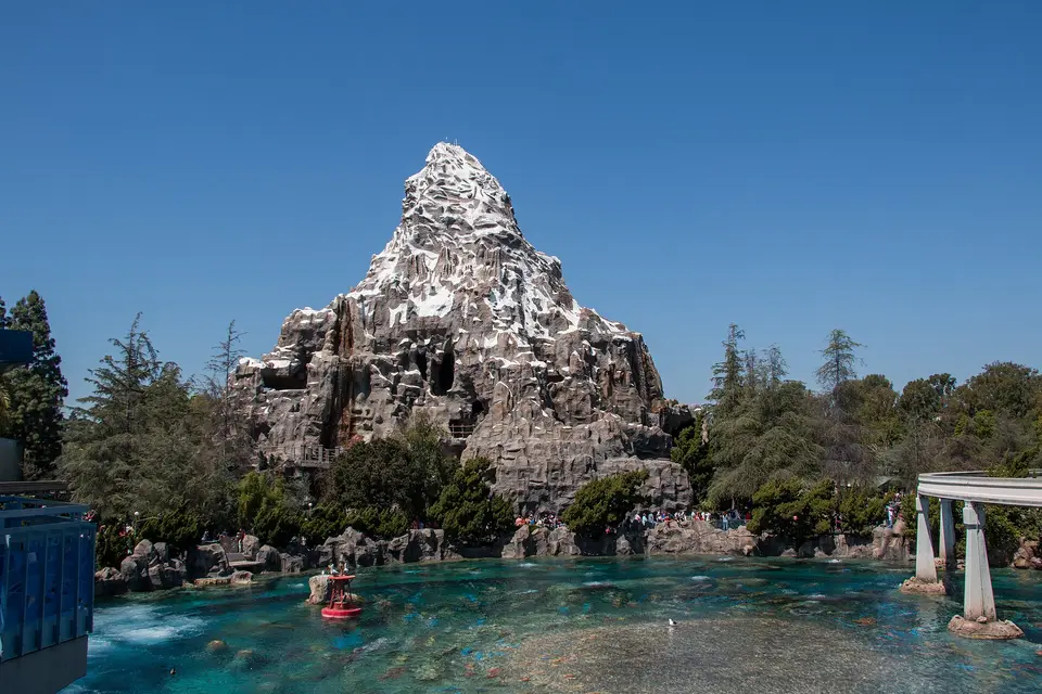 The snow-capped Matterhorn ride rising above the submarine lagoon at Disneyland