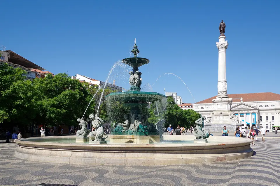 The baroque fountain and column of Rossio square in central Lisbon