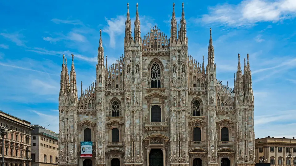 Milan Cathedral and Piazza del Duomo under a blue sky