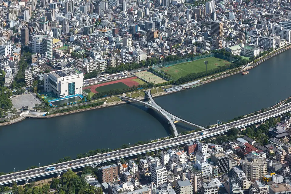 The curving Sakura Bridge across the Sumida River in Tokyo, seen from above