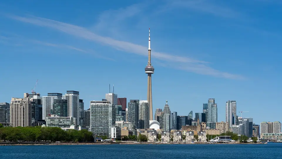 The Toronto skyline and CN Tower seen across the water from Trillium Park on a clear day