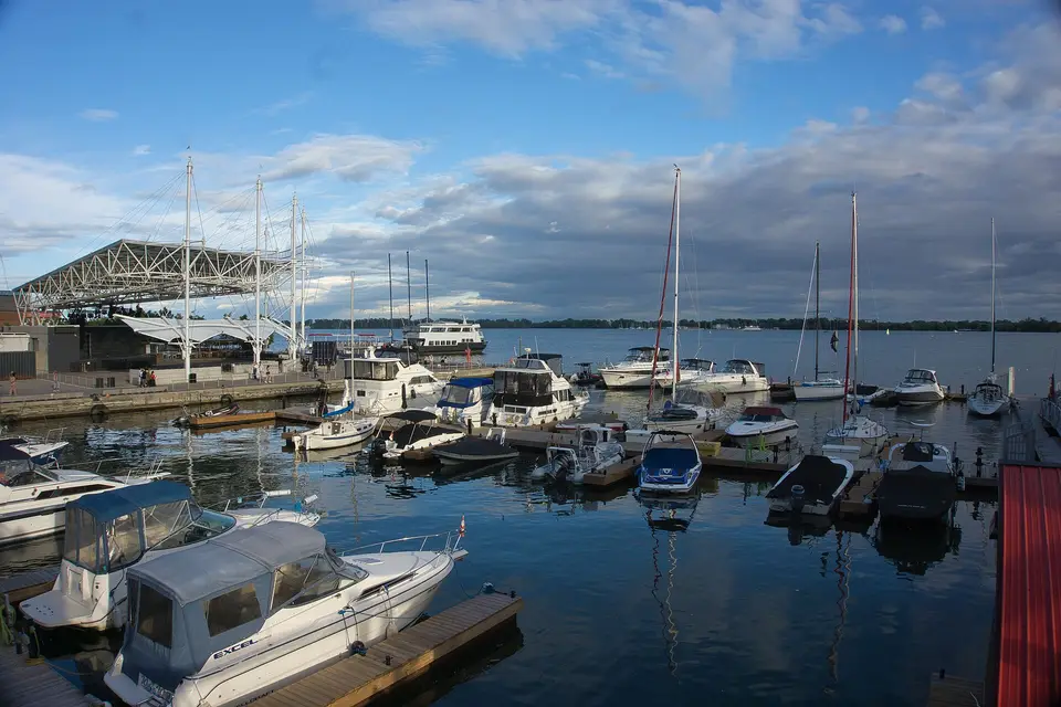 Sailboats and motor boats docked in a marina at the Harbourfront on Lake Ontario
